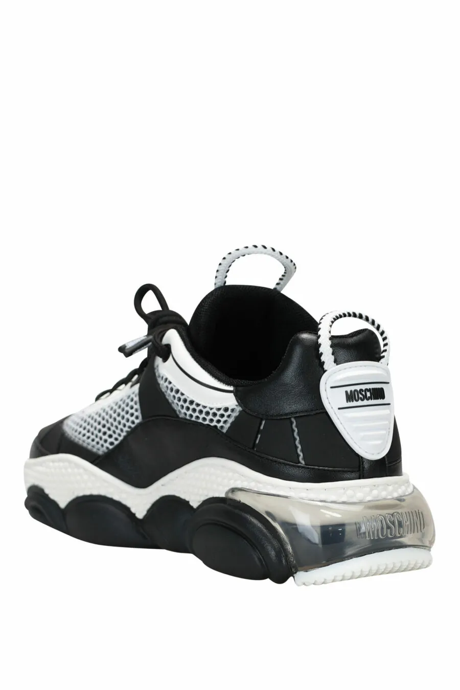Zapatillas bicolor blancas y negras con suela 